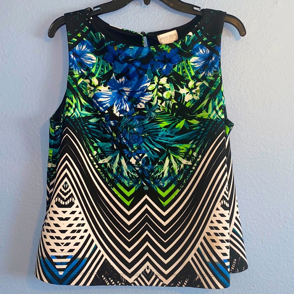 Sleeveless floral/print blouse, XL, with black lining.